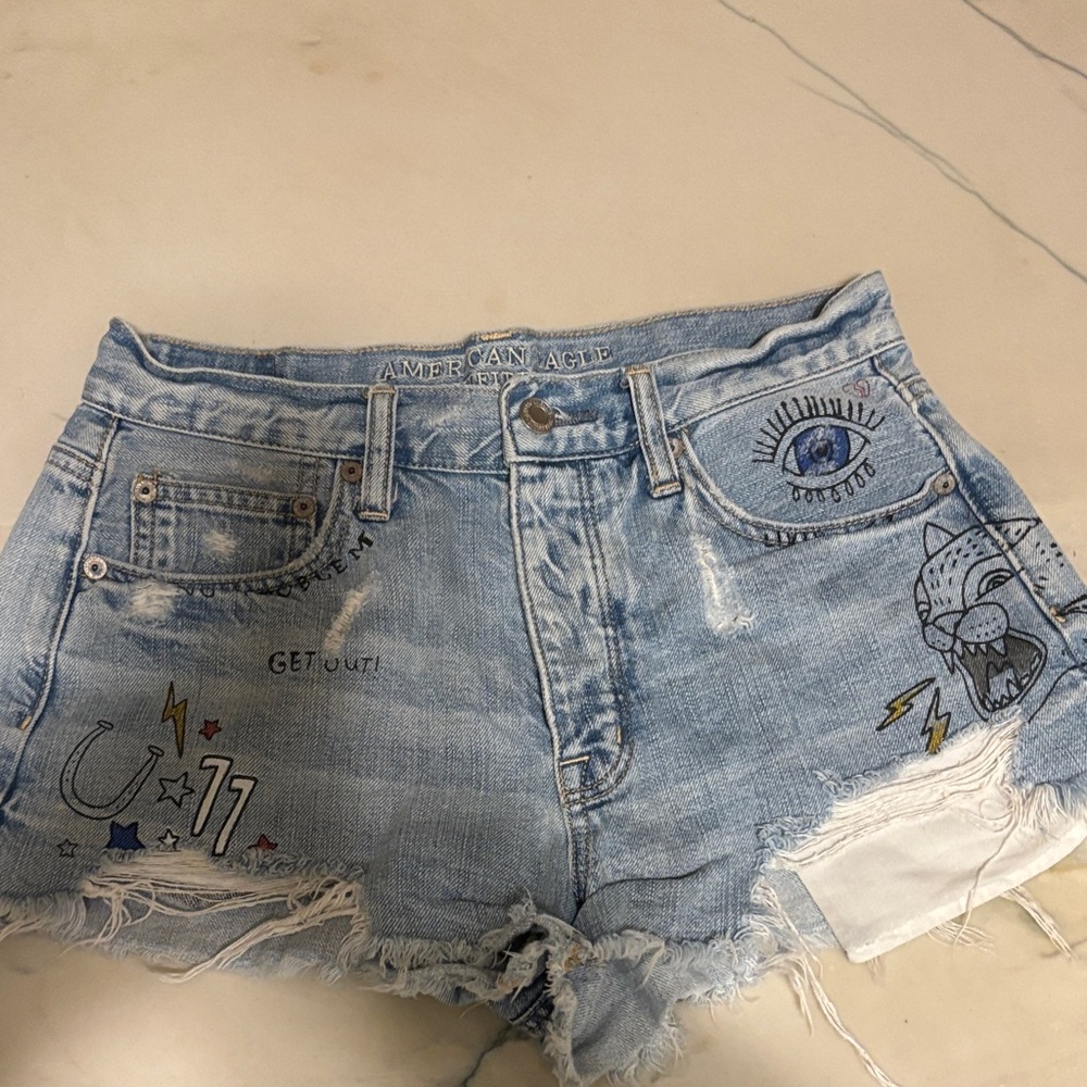 American Eagle Outfitters Light Blue Distressed Denim Shorts with Graphic Detail
